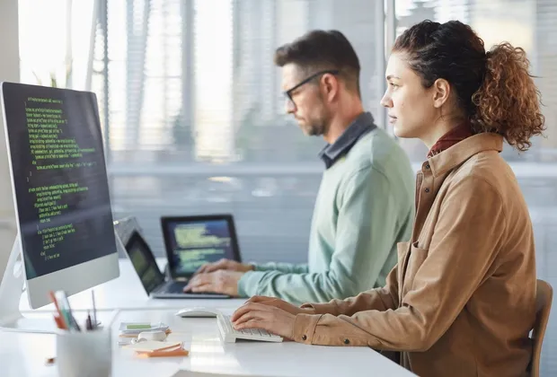 a male and female software developer in Toronto