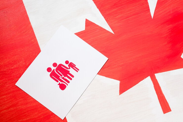 family icon stamped on a Canadian Flag